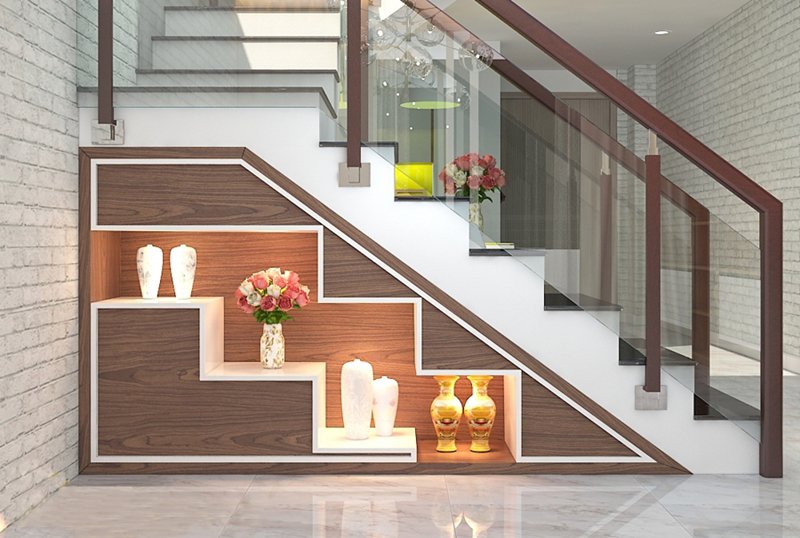 Với những kiểu kệ trang trí cầu thang phòng khách hiện đại, bạn có thể trang trí cho căn phòng một cách đẹp mắt và tinh tế nhất. Chúng mang đến vẻ đẹp sang trọng và tiện nghi cho không gian sống của bạn. Tham khảo hình ảnh liên quan để chọn cho mình mẫu kệ trang trí phù hợp.